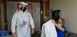 Nurses donning PPE on a covid unit in New Orleans